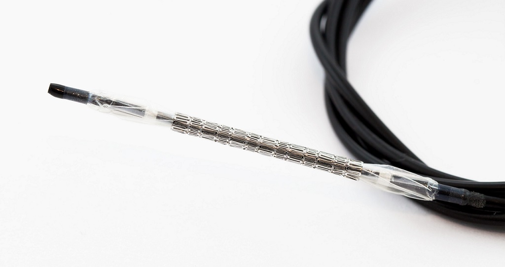 mesh metal balloon-expandable stent for endovascular surgery siting on the delivery device